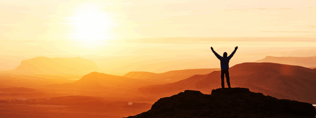 Silhouette man mountain top person silhouette rock sport active life concept